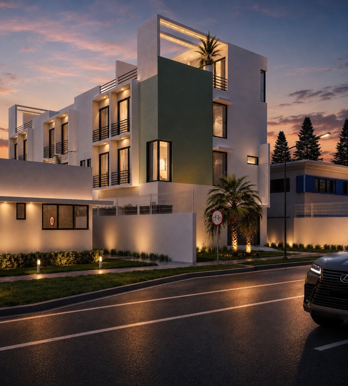 Maison Normandy townhomes at dusk, Normandy Isle